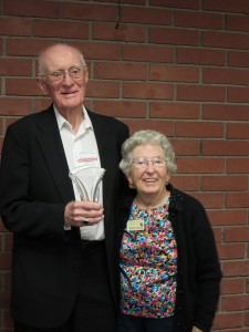 Board celebrates emeritus board member George Spindt, pictured here with his wife Evelyn, at a dinner in his honor (July 2013).